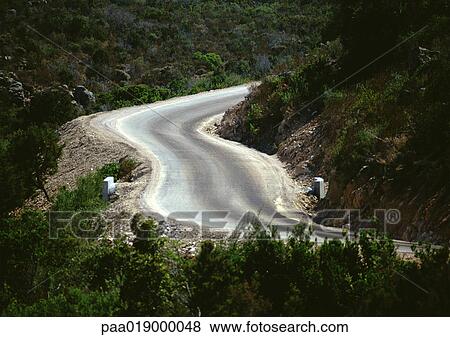 Road through mountainous region. View Large Photo Image Stock Photo - Road through mountainous region.. Fotosearch