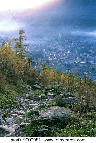 Rock path overlooking city in mountains View Large Photo Image Stock Image - Rock path overlooking city in mountains. Fotosearch