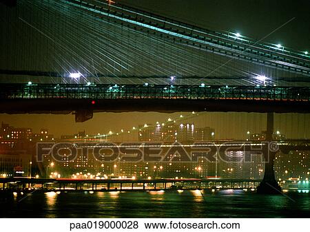 USA, NY, Brooklyn Bridge, lit up at night View Large Photo Image Stock Photo - USA, NY, Brooklyn Bridge, lit up at night. Fotosearch