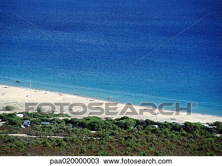 Stock Image - Beach and blue sea, aerial view. Fotosearch