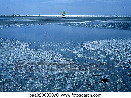 Stock Image - Beach at low tide. Fotosearch