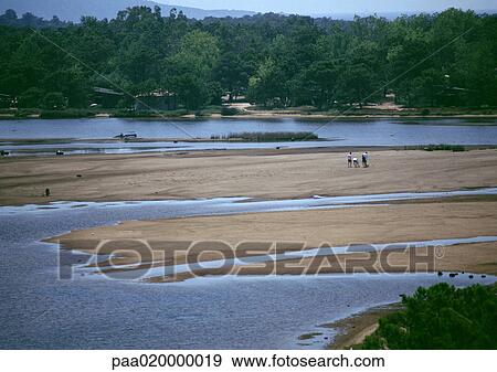 Stock Photo - Beach at low tide. Fotosearch