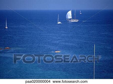 Boats in sea View Large Photo Image Picture - Boats in sea. Fotosearch