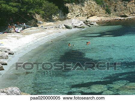Corsica, beach and turquoise water View Large Photo Image Stock Photography - Corsica, beach and turquoise water. Fotosearch