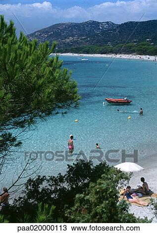 Stock Image - People at beach, high angle view. Fotosearch