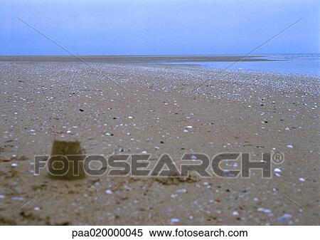 Stock Photography - Sand tower on beach. Fotosearch