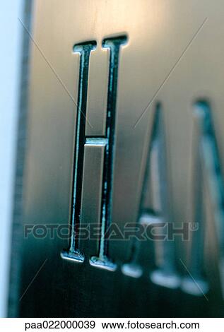 Stock Photo - H, text, etched.. Fotosearch