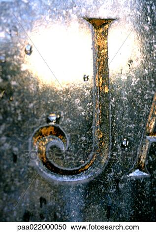 Stock Image - J, text, engraved. Fotosearch