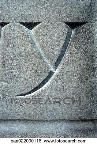 Stock Photograph - Y, text, carved. Fotosearch