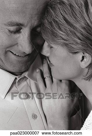 Couple close to one another, black and white. View Large Photo Image Stock Photo - Couple close to one another, black and white.. Fotosearch