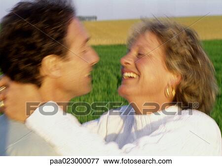 Couple embracing, blurred. View Large Photo Image Stock Photo - Couple embracing, blurred.. Fotosearch