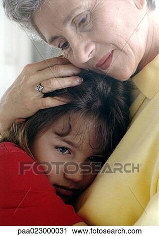Senior hugging girl View Large Photo Image Stock Image - Senior hugging girl. Fotosearch