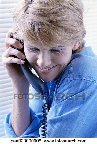 Woman on phone smiling, portrait. View Large Photo Image Stock Photography - Woman on phone smiling, portrait.. Fotosearch