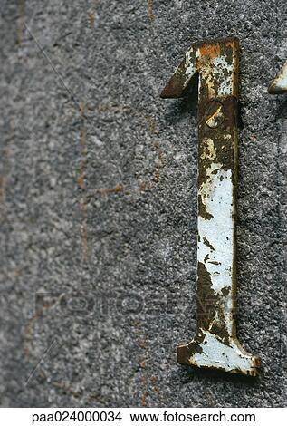 1 text, rusty metal number on stone wall View Large Photo Image Picture - 1 text, rusty metal number on stone wall. Fotosearch