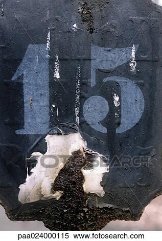 Stock Photography - 15 text, stenciled on peeling surface. Fotosearch