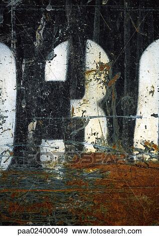 Stock Photo - 3 text stenciled on rusting surface. Fotosearch