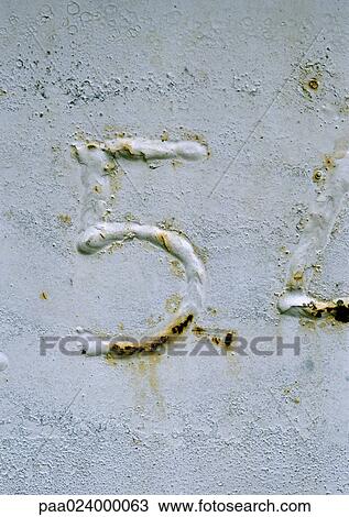Stock Image - 5 text, embossed and rusty on metal surface. Fotosearch