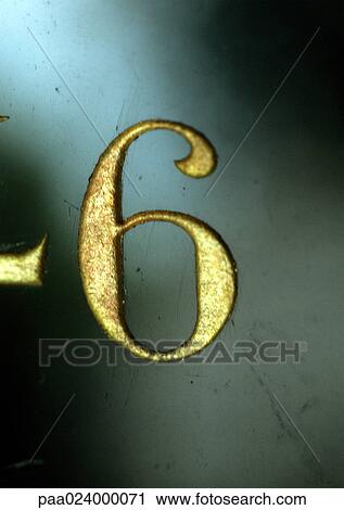 Stock Image - 6 text, embossed in gold. Fotosearch