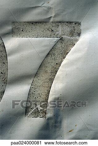Stock Image - 7 text, cut out in paper. Fotosearch