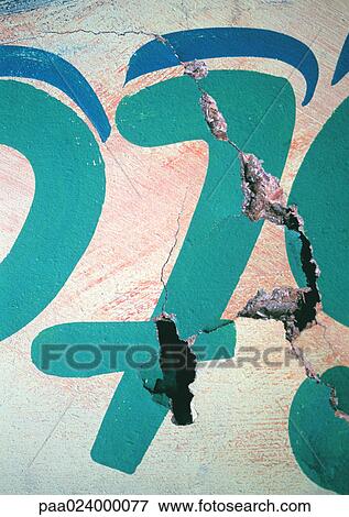 Stock Photo - 7 text, painted on cracking surface. Fotosearch