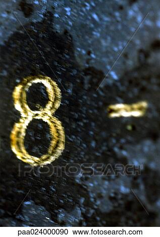 Stock Image - 8 text, embossed in gold. Fotosearch
