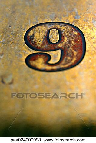Stock Photo - 9 text, printed on worn surface. Fotosearch