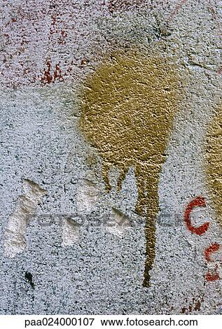 Stock Photo - . text, in dripping gold spray paint.. Fotosearch