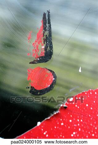 Stock Photography - ! text, painted on glass, partially worn away. Fotosearch
