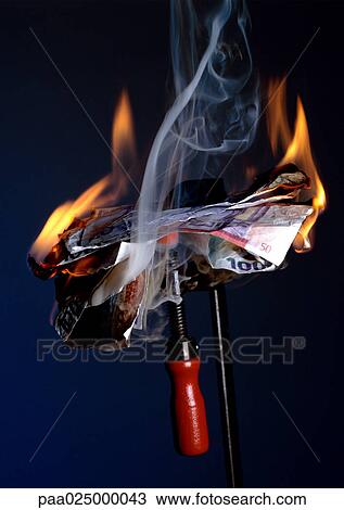 Stock Image - Burning money.. Fotosearch