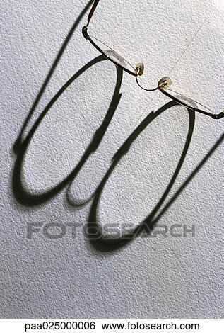 Glasses with shadow. View Large Photo Image Stock Photograph - Glasses with shadow.. Fotosearch