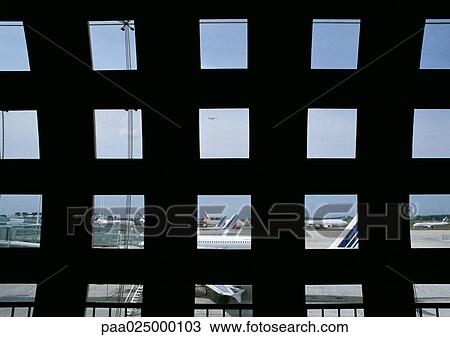 Stock Image - Lattice window at airport.. Fotosearch