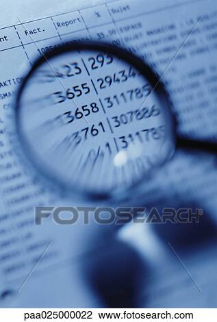 Magnifying glass magnifying numbers on document, close-up, blurred View Large Photo Image Stock Image - Magnifying glass magnifying numbers on document, close-up, blurred. Fotosearch