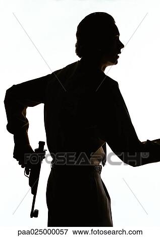 Man holding gun, silhouette. View Large Photo Image Stock Photo - Man holding gun, silhouette.. Fotosearch