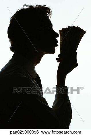 Man kissing money, silhouette. View Large Photo Image Stock Photograph - Man kissing money, silhouette.. Fotosearch
