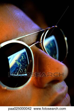 Man wearing reflective sunglasses. View Large Photo Image Stock Image - Man wearing reflective sunglasses.. Fotosearch
