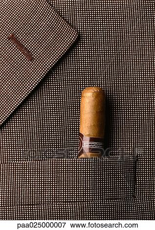Stock Photo - Man's jacket lapel with cigar in pocket. Fotosearch