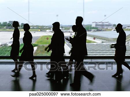 People walking at airport. View Large Photo Image Stock Photo - People walking at airport.. Fotosearch