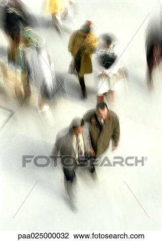 People walking, blurred motion, high angle view View Large Photo Image Stock Image - People walking, blurred motion, high angle view. Fotosearch