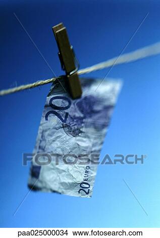 Twenty euro bill hanging on clothesline. View Large Photo Image Picture - Twenty euro bill hanging on clothesline.. Fotosearch