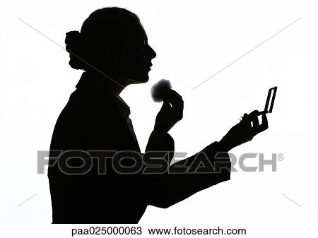 Woman applying makeup, silhouette. View Large Photo Image Stock Image - Woman applying makeup, silhouette.. Fotosearch