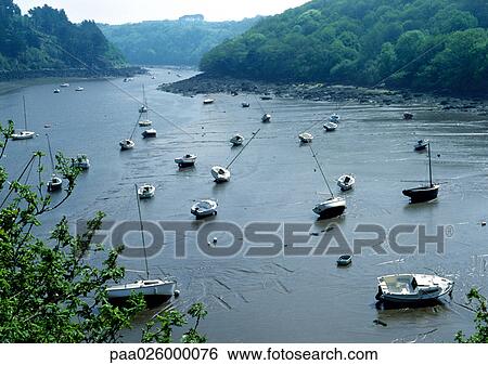France, Brittany, small fishing boats on river bottom View Large Photo Image Stock Photograph - France, Brittany, small fishing boats on river bottom. Fotosearch