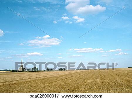 France, Picardy, field with trees and church in distance View Large Photo Image Stock Photo - France, Picardy, field with trees and church in distance. Fotosearch