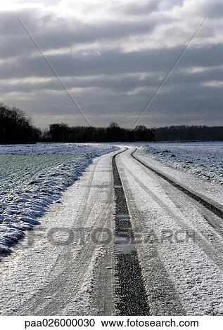 France, Picardy, road through fields with snow View Large Photo Image Stock Image - France, Picardy, road through fields with snow. Fotosearch