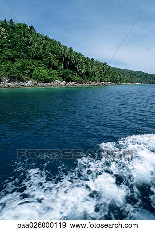 Malaysia, Perhentian Besar Island, wake on water, shoreline. View Large Photo Image Stock Photo - Malaysia, Perhentian Besar Island, wake on water, shoreline.. Fotosearch