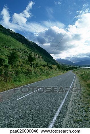Stock Photograph - New Zealand, rural road.. Fotosearch