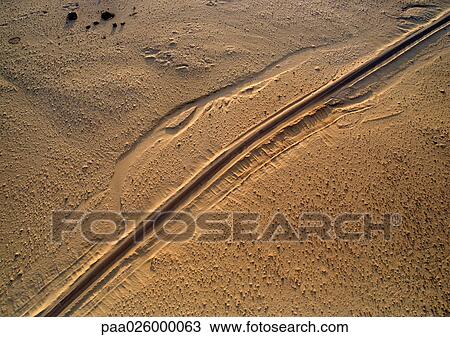 Track in sand, close-up View Large Photo Image Stock Image - Track in sand, close-up. Fotosearch