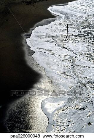 Waves on shore. View Large Photo Image Stock Photo - Waves on shore.. Fotosearch