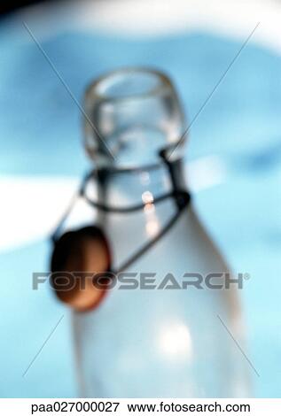 Bottle, blurred, close-up View Large Photo Image Stock Photo - Bottle, blurred, close-up. Fotosearch