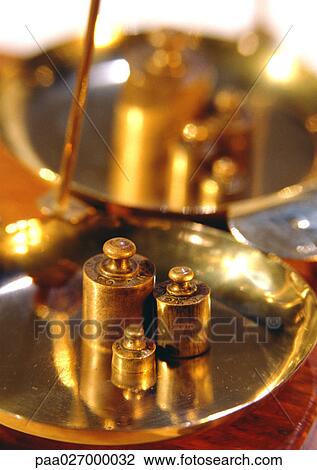 Brass weights on scales, close-up View Large Photo Image Stock Image - Brass weights on scales, close-up. Fotosearch