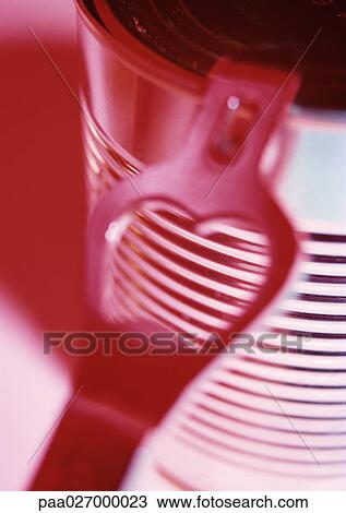 Can-opener on edge of can, close-up View Large Photo Image Stock Image - Can-opener on edge of can, close-up. Fotosearch